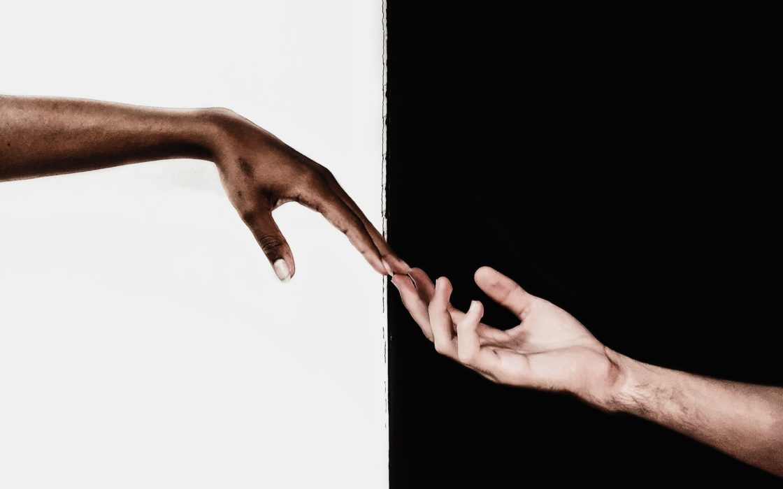hands-in-front-of-white-and-black-background-3541916
